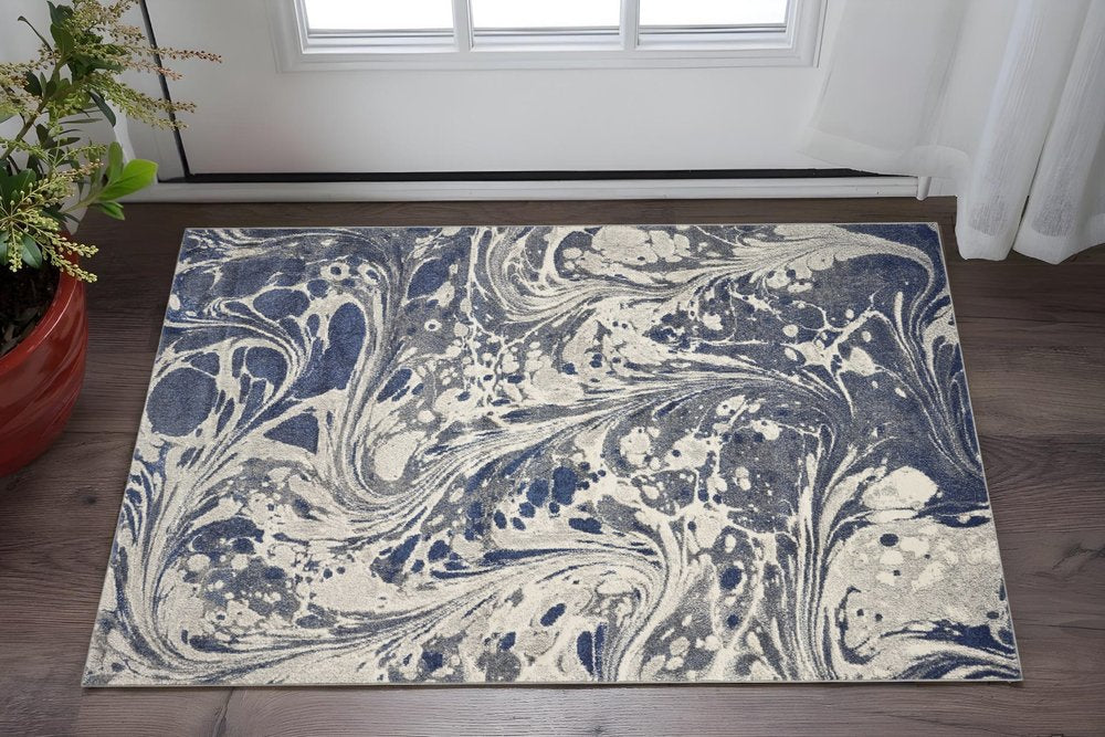 5' X 8' Blue Gray And Ivory Abstract Area Rug