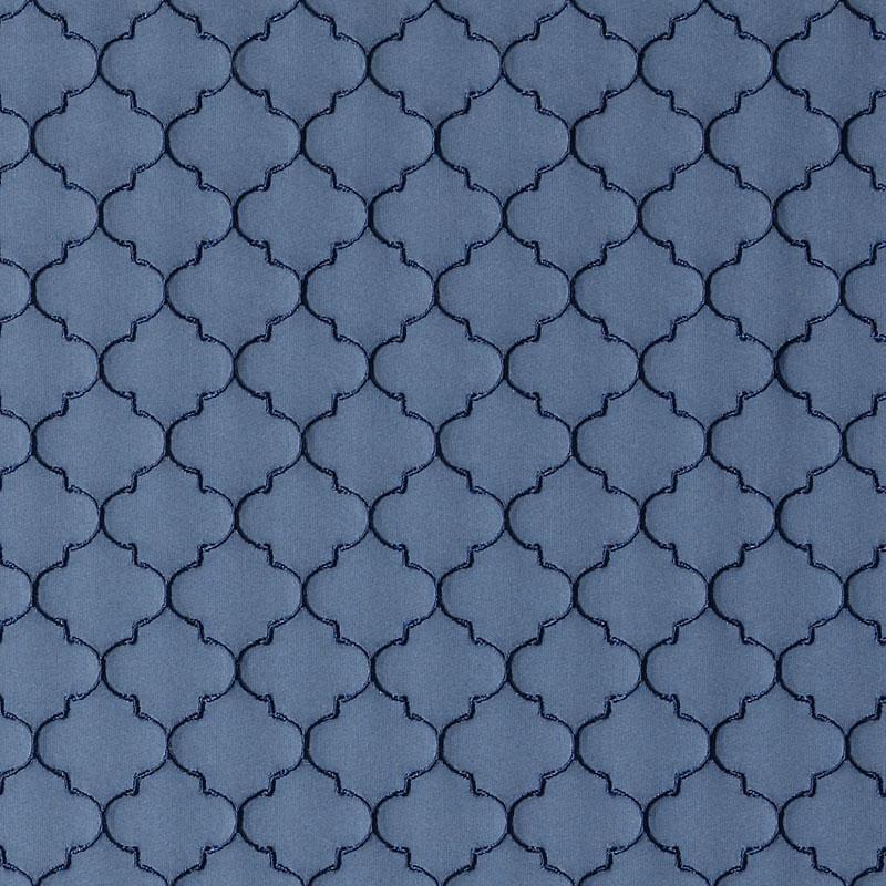 Blue sapphire quatrefoil lattice drapery fabric with dark navy outlines and tonal shading.