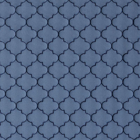 Blue sapphire quatrefoil lattice drapery fabric with dark navy outlines and tonal shading.