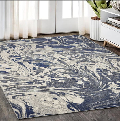 5' X 8' Blue Gray And Ivory Abstract Area Rug