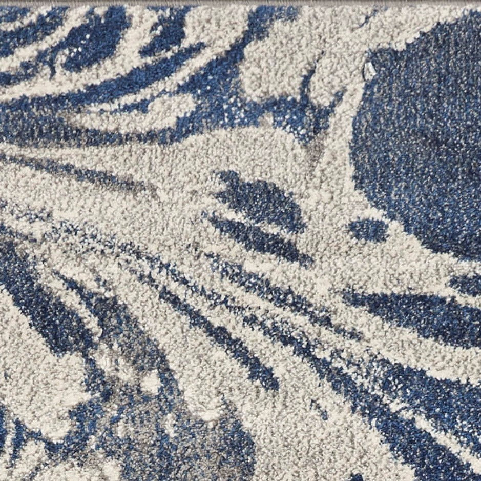 5' X 8' Blue Gray And Ivory Abstract Area Rug