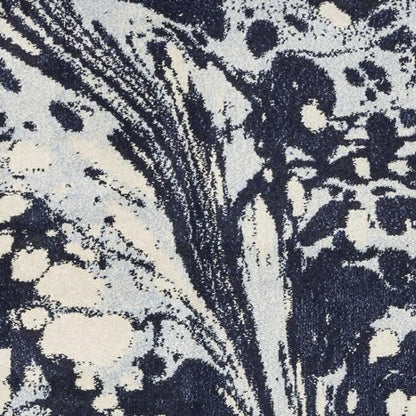 7' X 10' Blue And Ivory Abstract Area Rug
