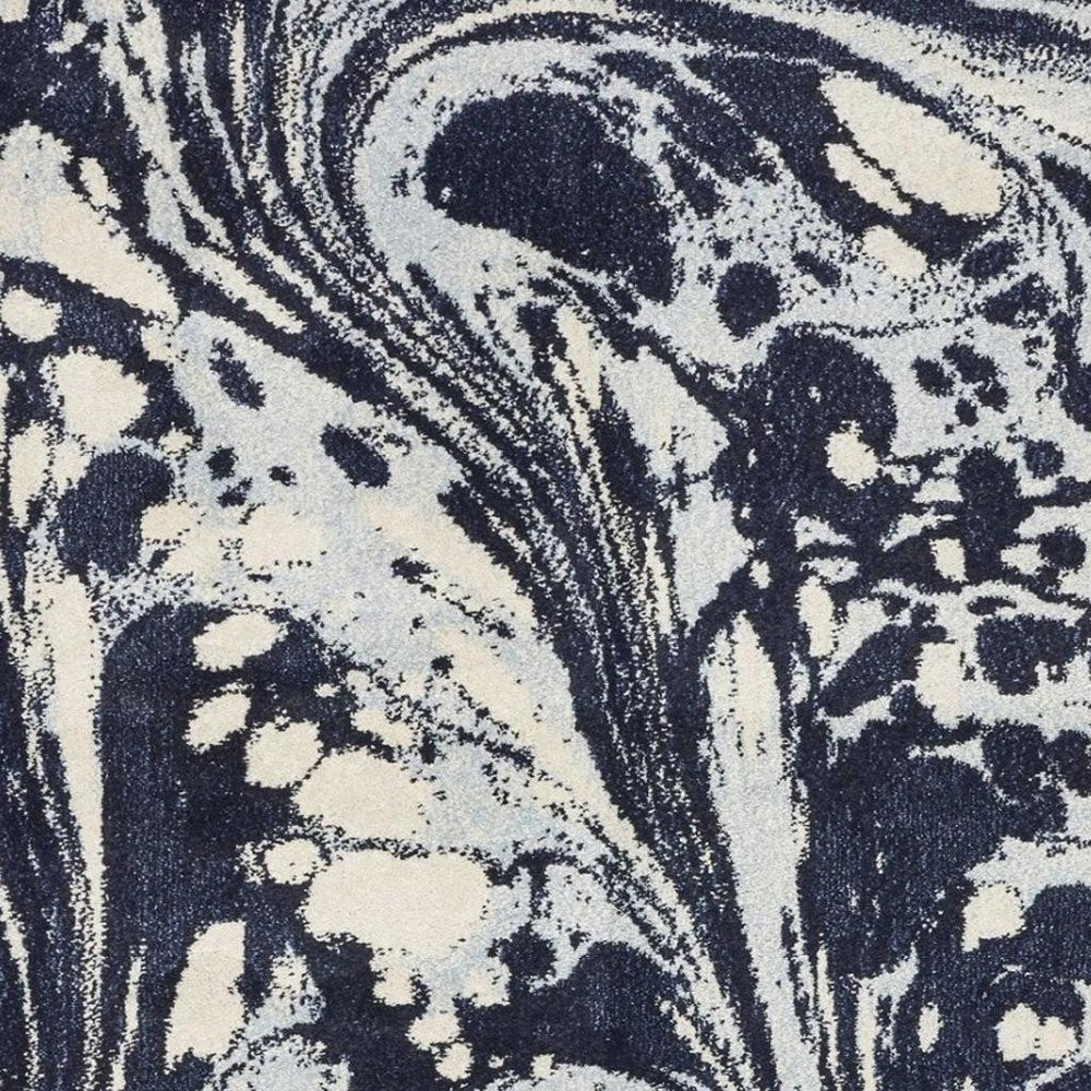 5' X 7' Blue And Ivory Abstract Area Rug