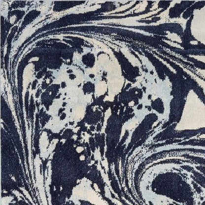 7' X 10' Blue And Ivory Abstract Area Rug