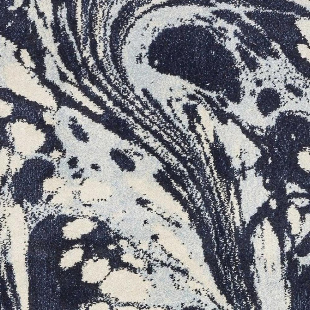 7' X 10' Blue And Ivory Abstract Area Rug