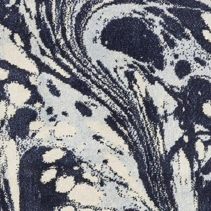 7' X 10' Blue And Ivory Abstract Area Rug