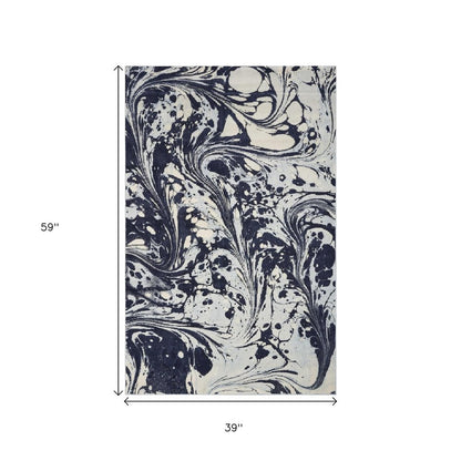 3' X 5' Blue And Ivory Abstract Area Rug