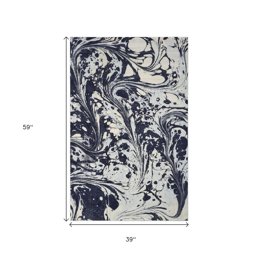 3' X 5' Blue And Ivory Abstract Area Rug