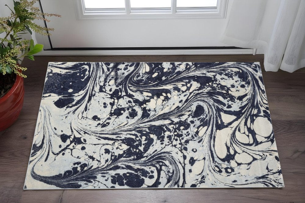 3' X 5' Blue And Ivory Abstract Area Rug