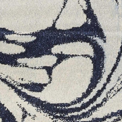 7' X 10' Blue And Ivory Abstract Area Rug