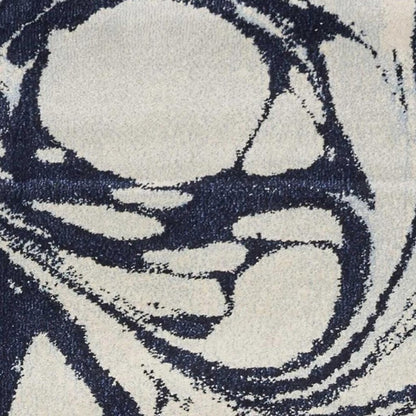 3' X 5' Blue And Ivory Abstract Area Rug