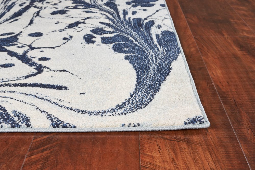 3' X 5' Blue And Ivory Abstract Area Rug