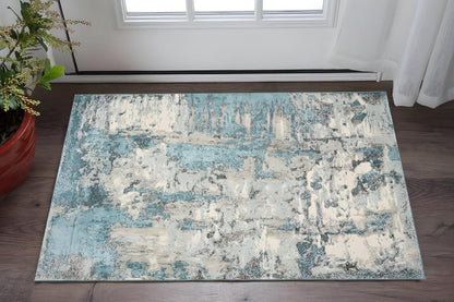 3' X 5' Ivory And Teal Abstract Area Rug