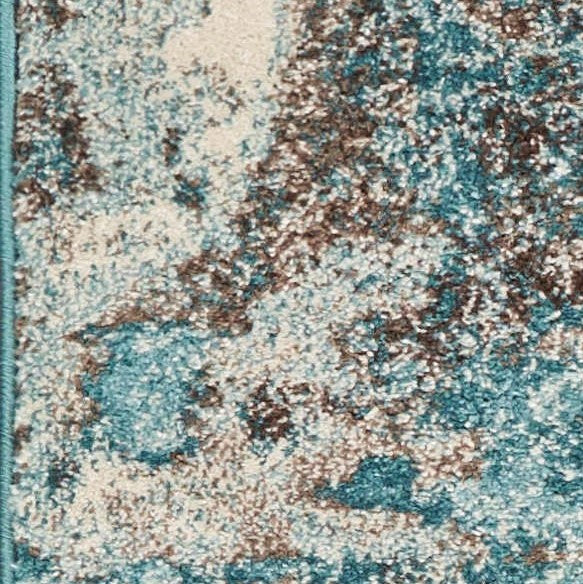 5' X 8' Ivory Teal Machine Woven Abstract Indoor Area Rug