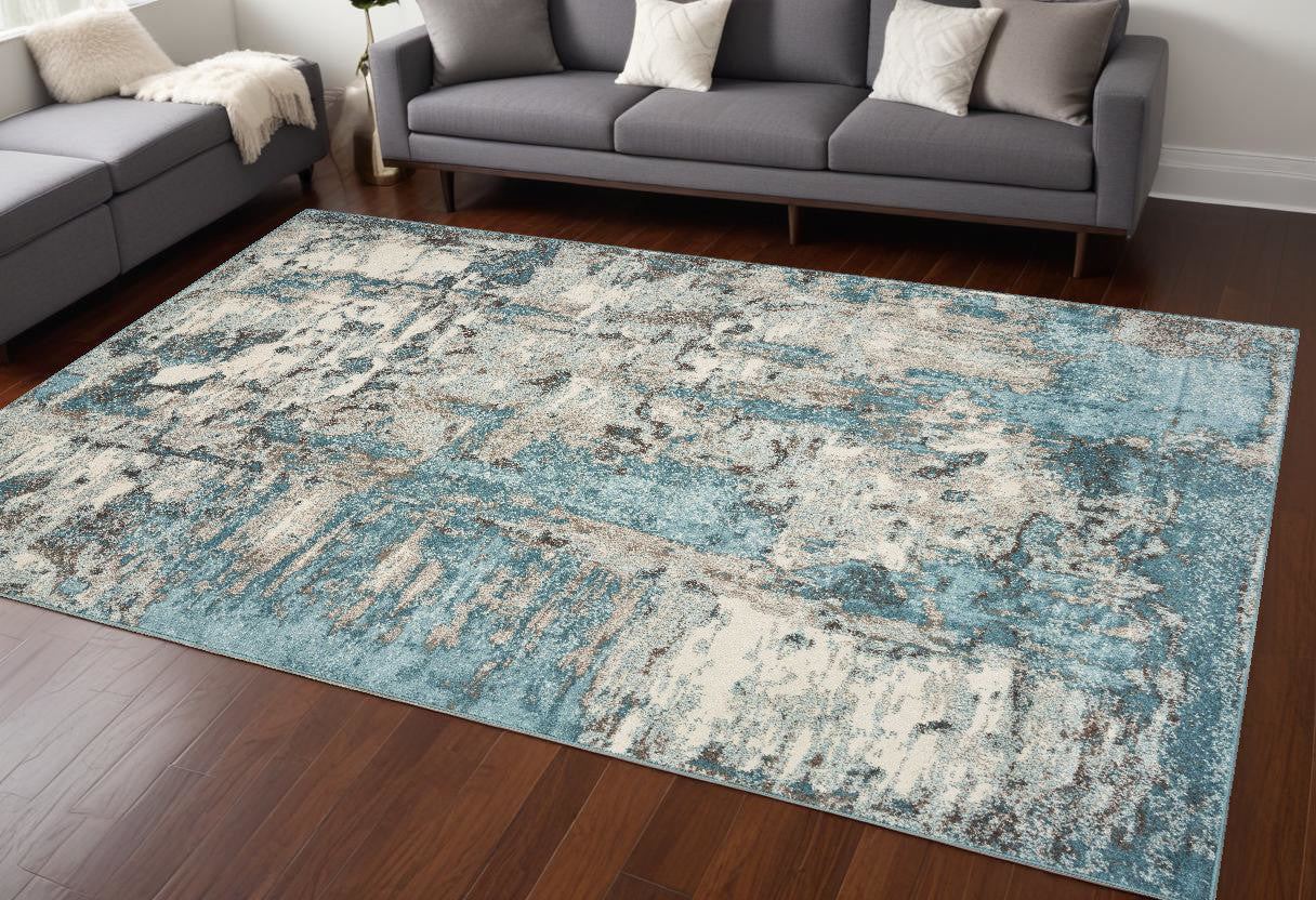 5' X 8' Ivory Teal Machine Woven Abstract Indoor Area Rug