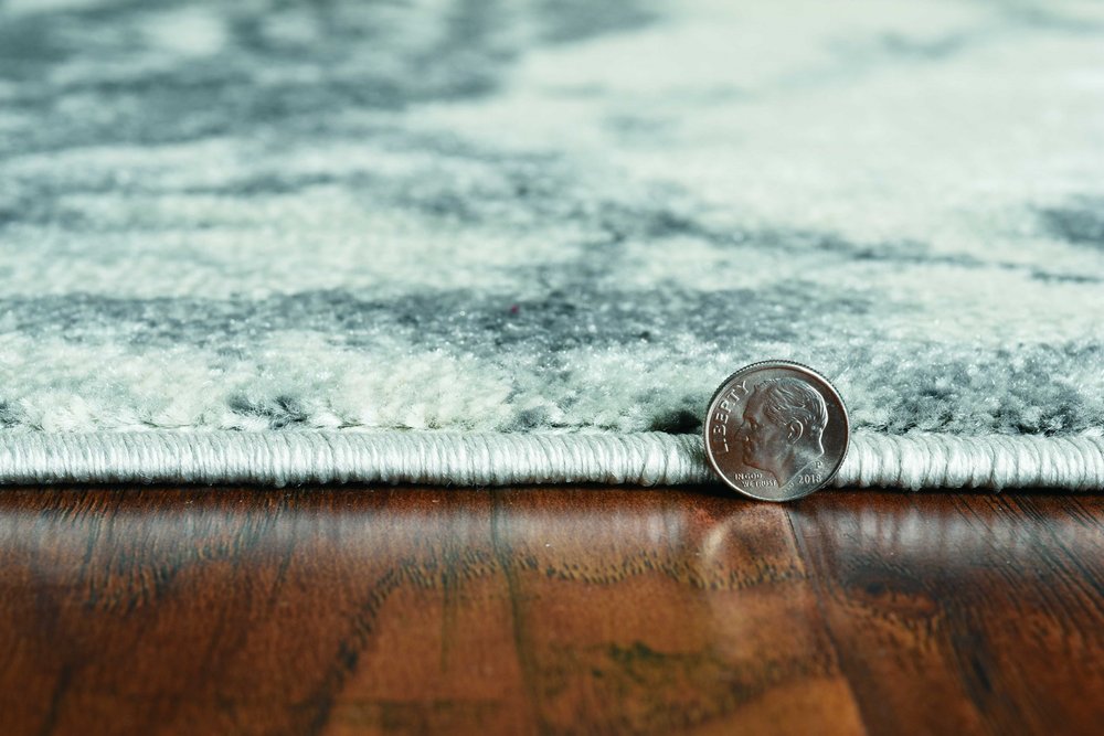 5' X 8' Gray And Ivory Abstract Area Rug