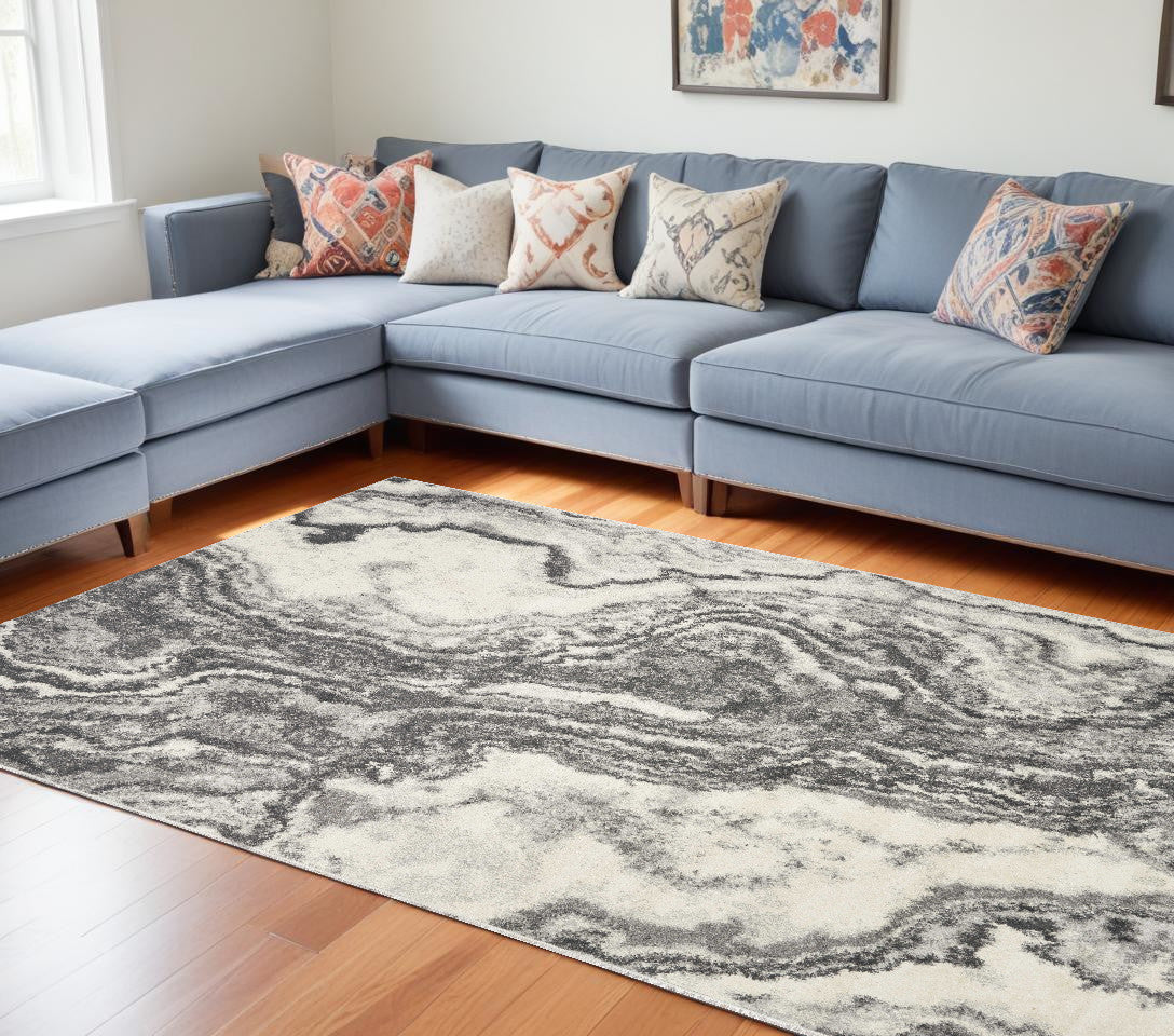 7' X 9' Gray and Ivory Abstract Shag Area Rug