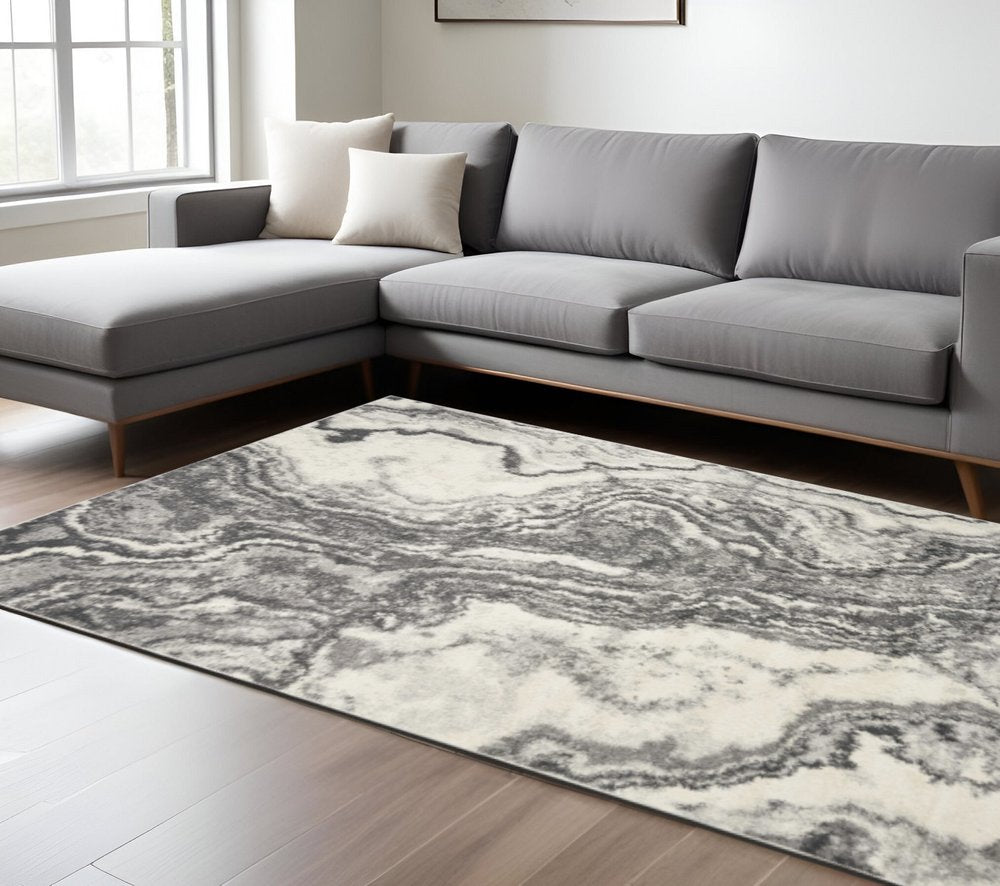 5' X 8' Gray And Ivory Abstract Area Rug