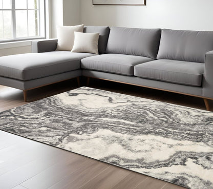 5' X 8' Gray And Ivory Abstract Area Rug