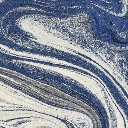 7' X 10' Blue And Beige Abstract Area Rug