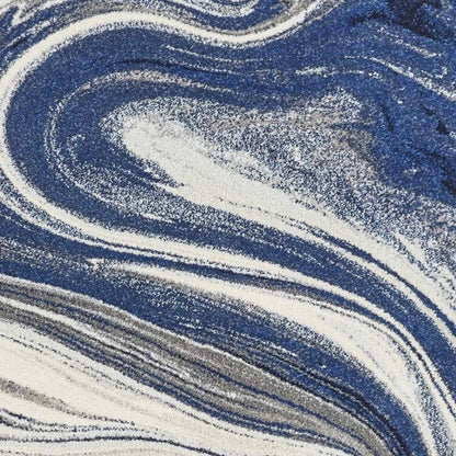 3' X 5' Blue And Beige Abstract Area Rug