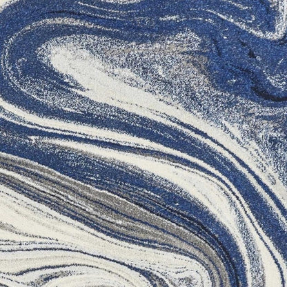 7' X 10' Blue And Beige Abstract Area Rug