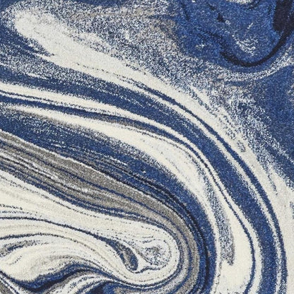 7' X 10' Blue And Beige Abstract Area Rug