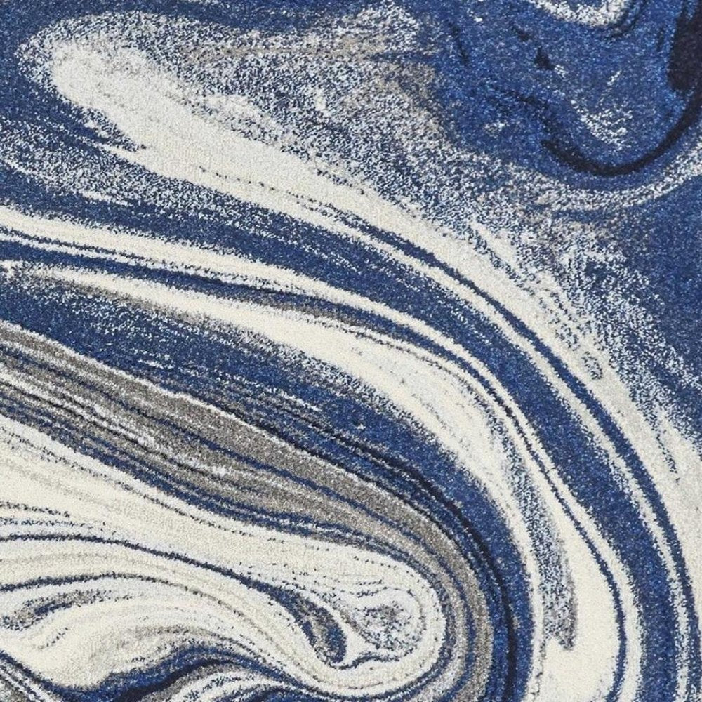 7' X 10' Blue And Beige Abstract Area Rug