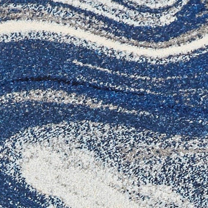 7' X 10' Blue And Beige Abstract Area Rug