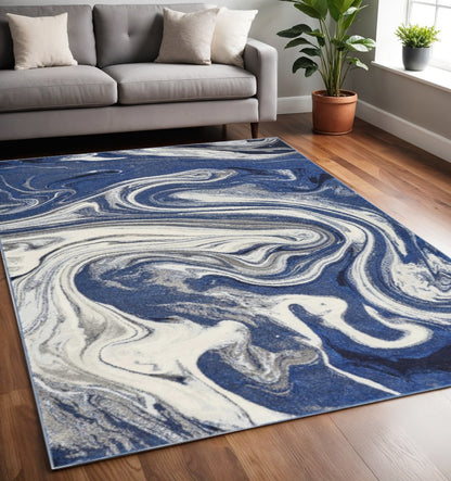 7' X 10' Blue And Beige Abstract Area Rug