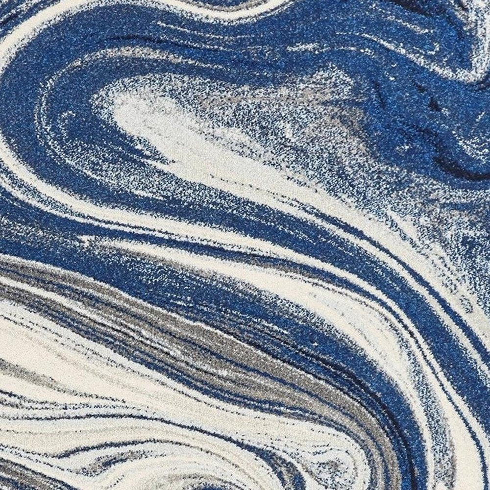 7' X 10' Blue And Beige Abstract Area Rug