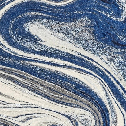 7' X 10' Blue And Beige Abstract Area Rug