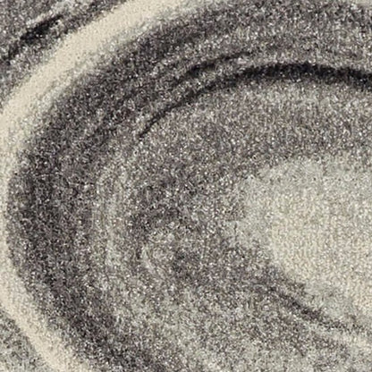 5' X 8' Ivory Black And Gray Abstract Area Rug