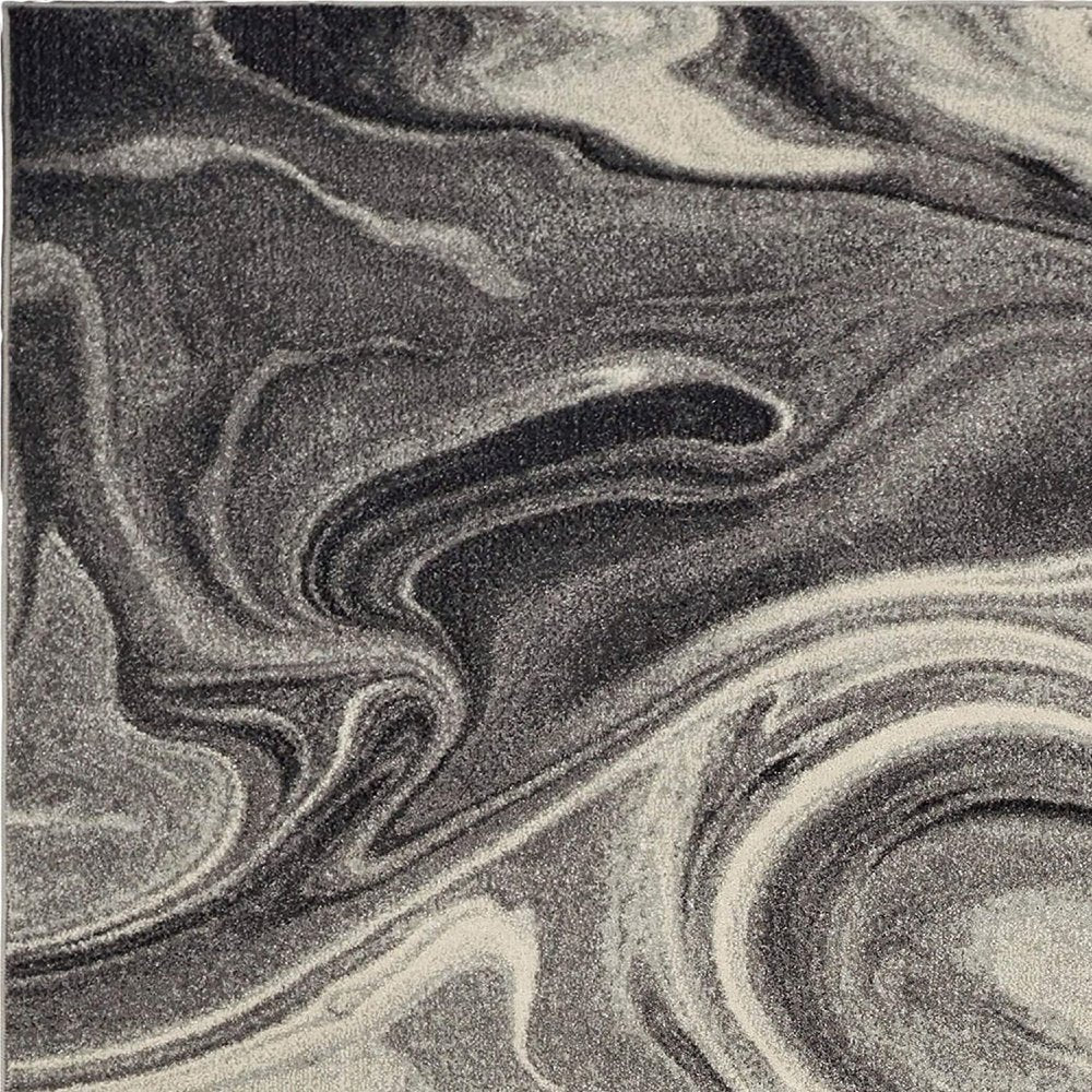 7' X 9' Ivory Black And Gray Abstract Shag Area Rug