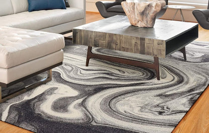 7' X 9' Ivory Black And Gray Abstract Shag Area Rug