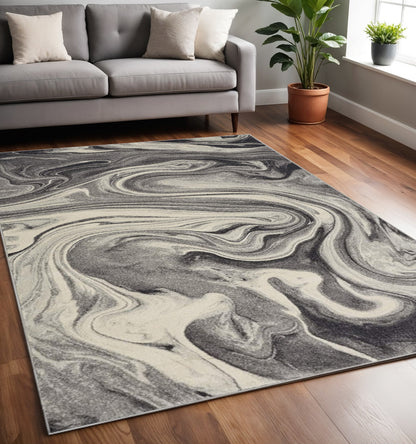 5' X 8' Ivory Black And Gray Abstract Area Rug