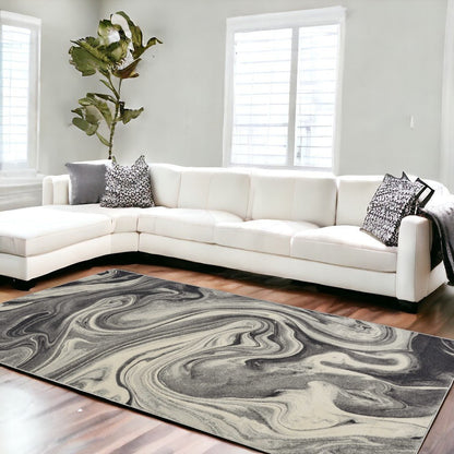 5' X 8' Ivory Black And Gray Abstract Area Rug