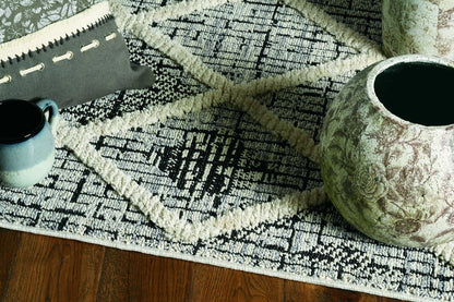 8' X 11' Cream And Charcoal Geometric Area Rug