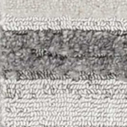 5' X 8' Gray and Ivory Abstract Area Rug