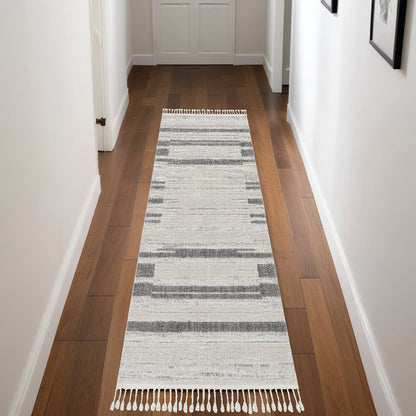 5' X 8' Gray and Ivory Abstract Area Rug