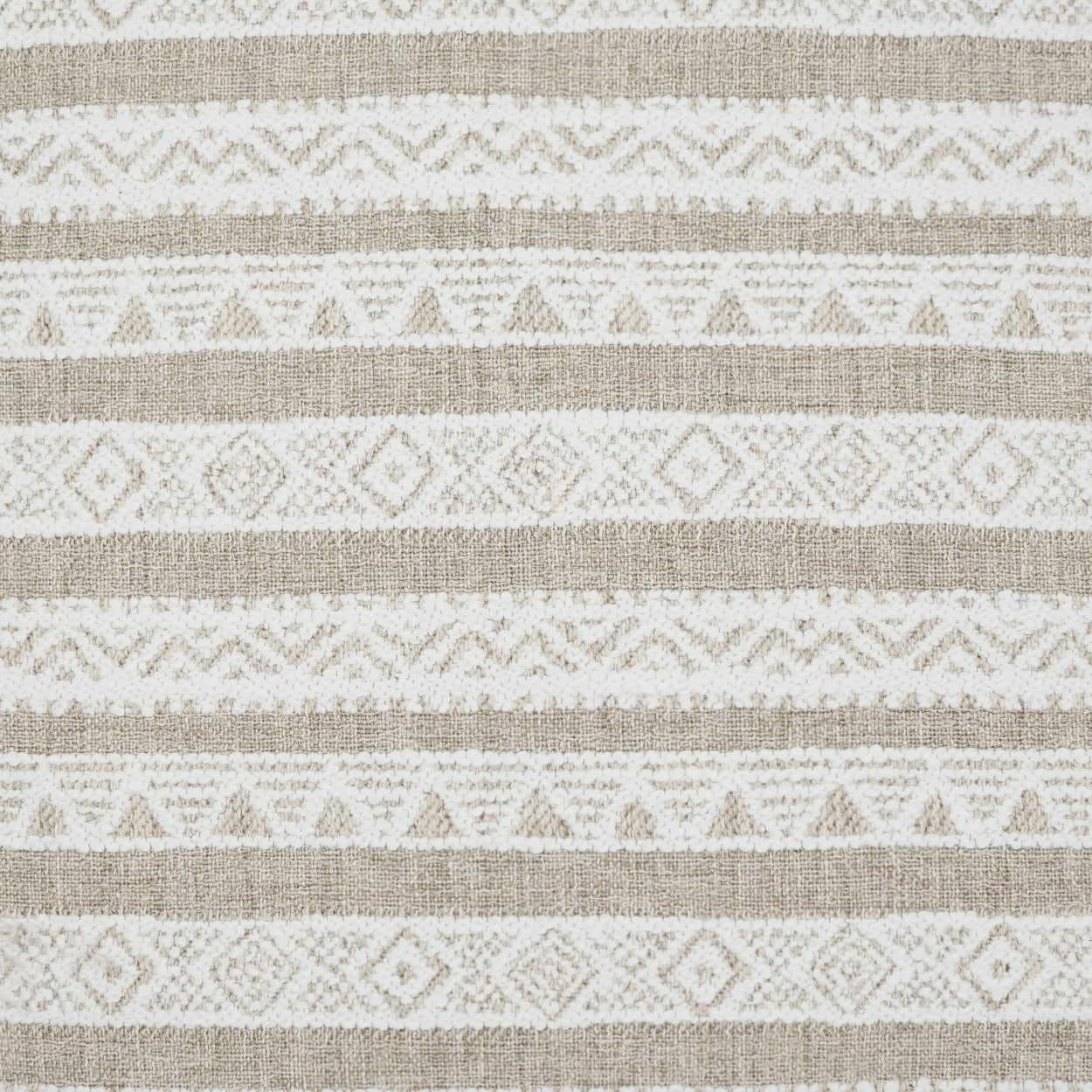 Beige and ivory woven pillow with geometric diamond and chevron patterns and a striped motif.