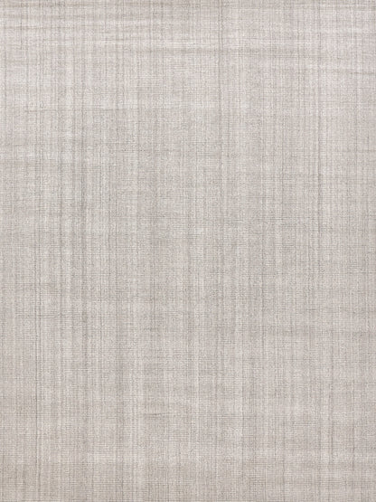 Beige hand-loomed indoor rug with a subtle crosshatch pattern.