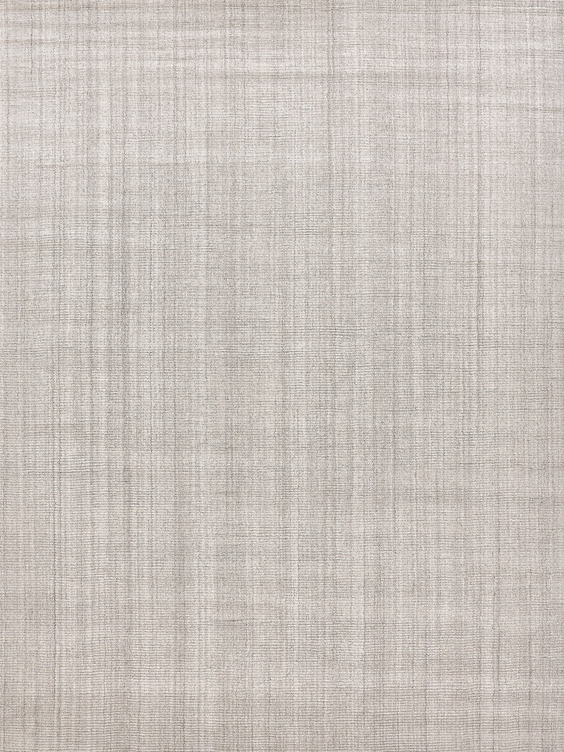 Beige taupe textured linen-look rug with a subtle plaid weave; indoor hand-loomed.