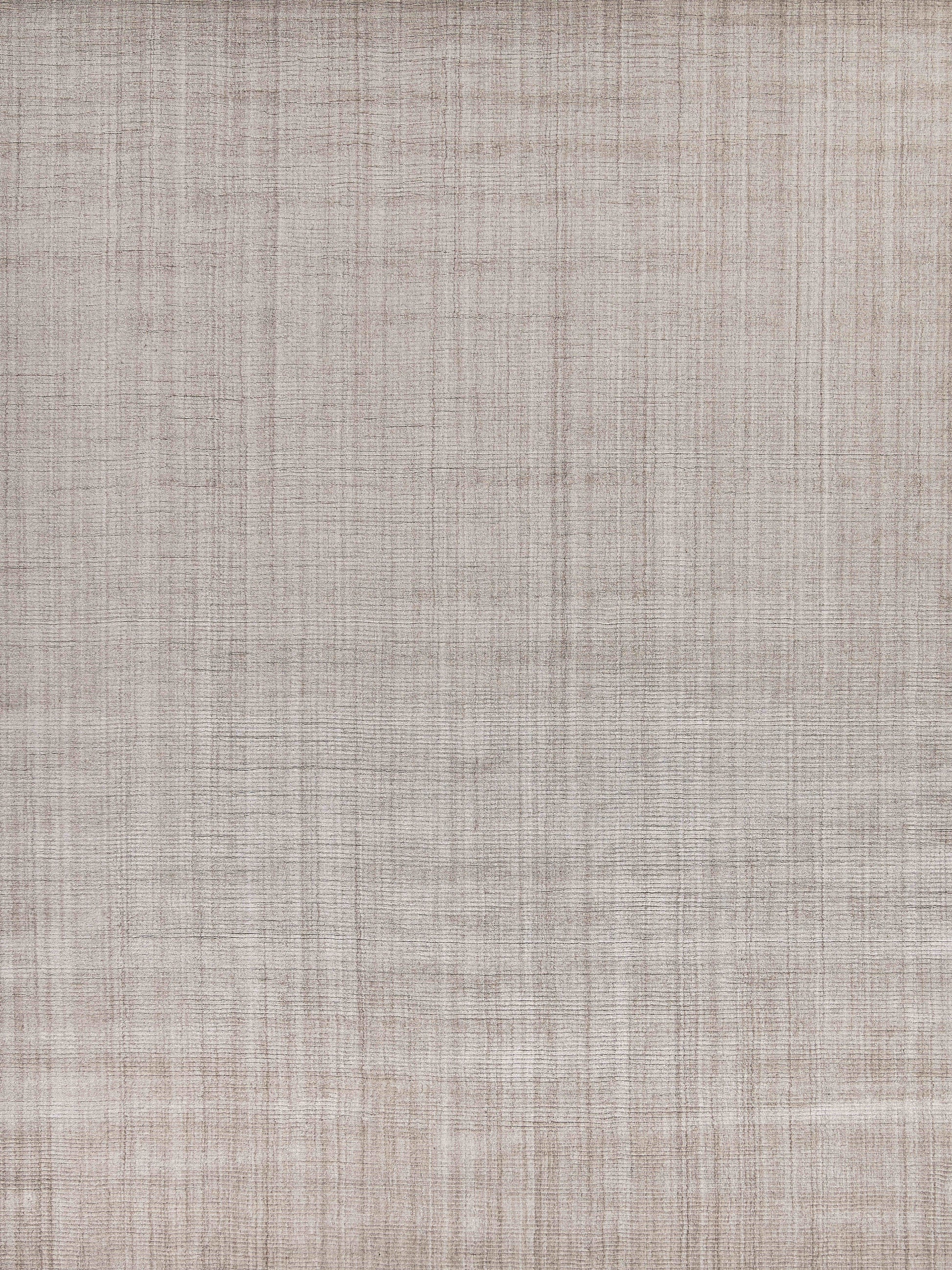 Light taupe indoor hand-loomed rug with linen-like woven texture and subtle crosshatched grid pattern.