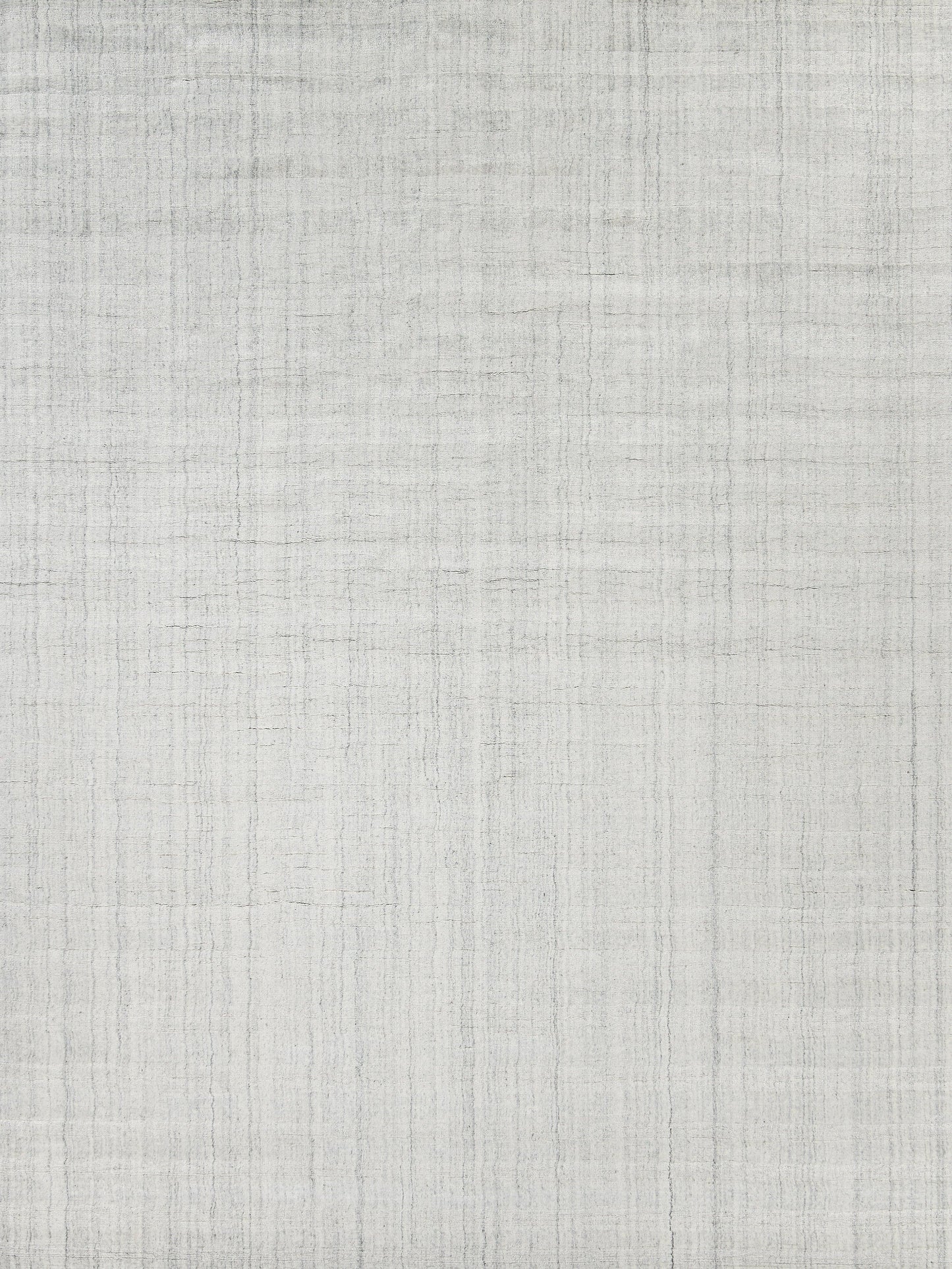 Light gray hand-loomed rug with a subtle woven texture; indoor use, 2' x 3'.
