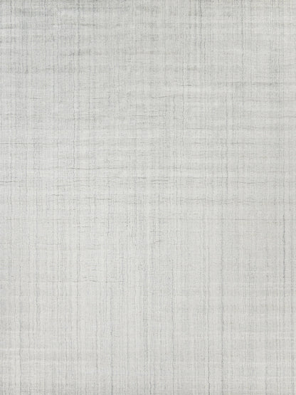 Light gray hand-loomed rug with a subtle woven texture; indoor use, 2' x 3'.