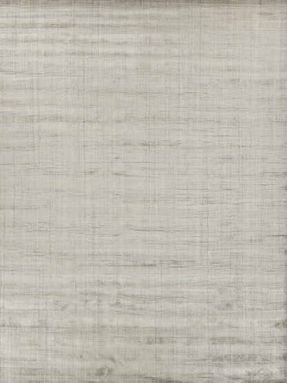 Beige hand-loomed rug with a linen-texture weave, subtle woven lines, and a striped pattern; indoor use.