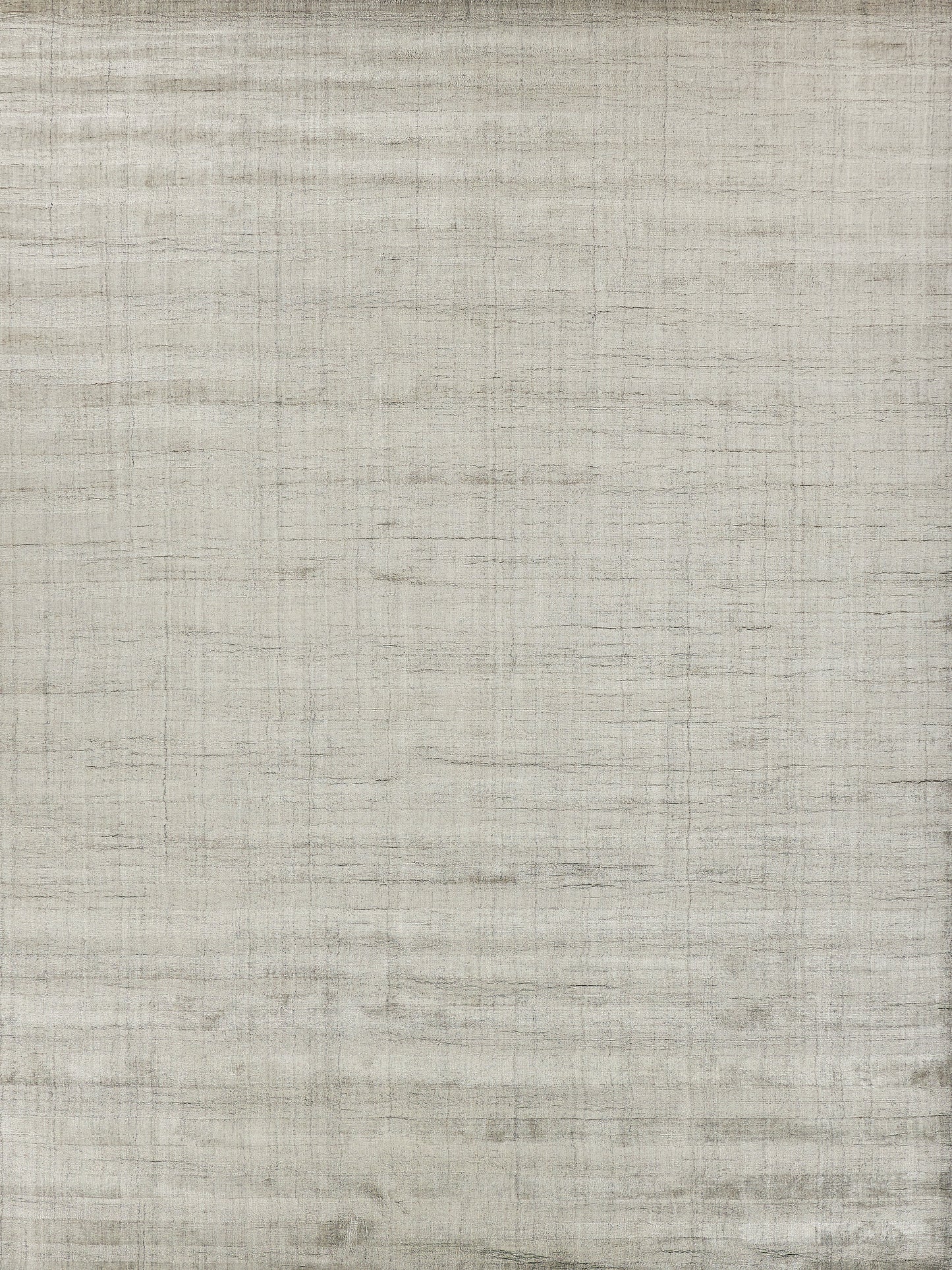 Beige rug with linen-textured surface and subtle gray stripes; indoor hand-loomed.