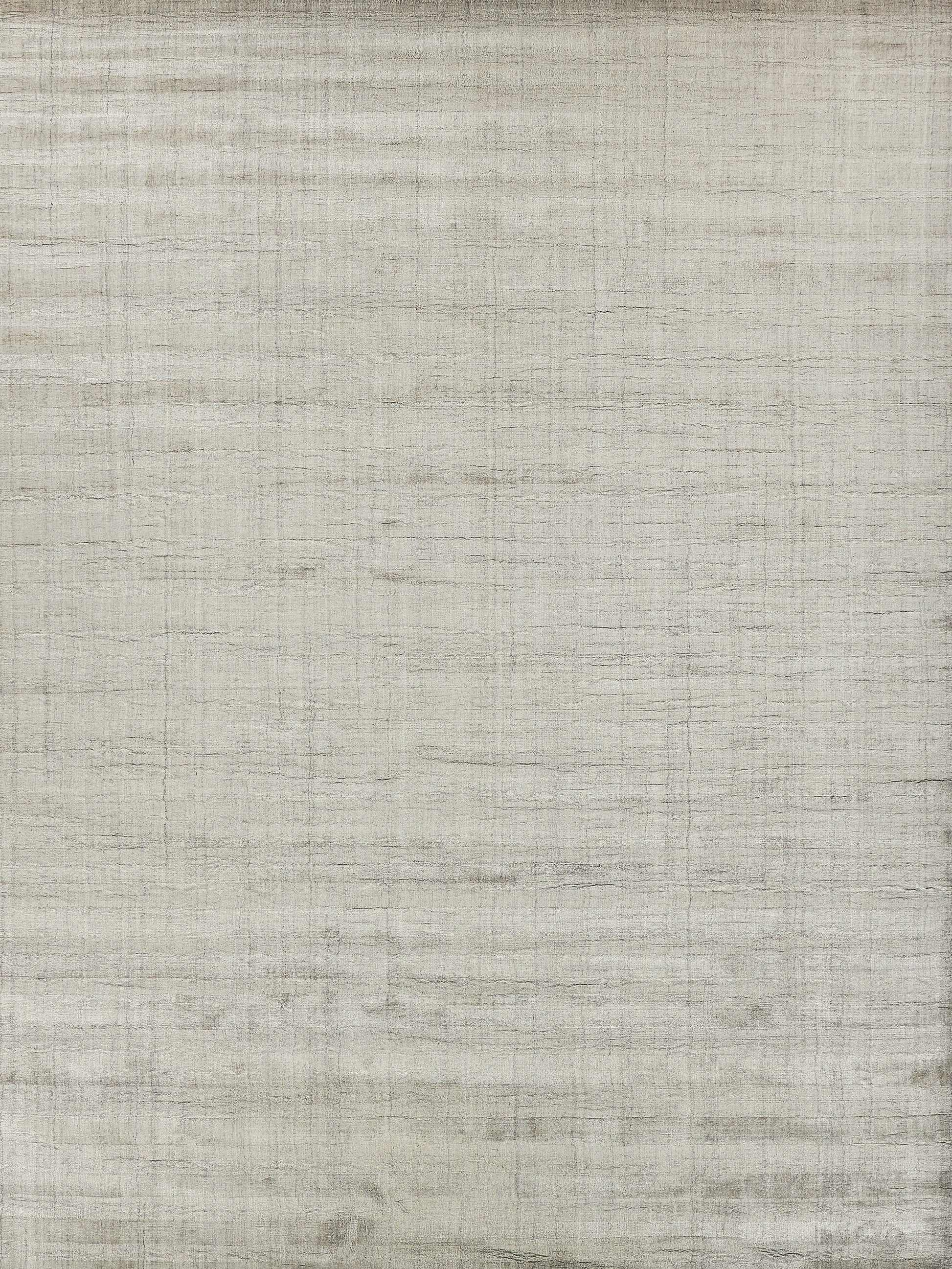 Beige rug with linen-textured surface and subtle gray stripes; indoor hand-loomed.