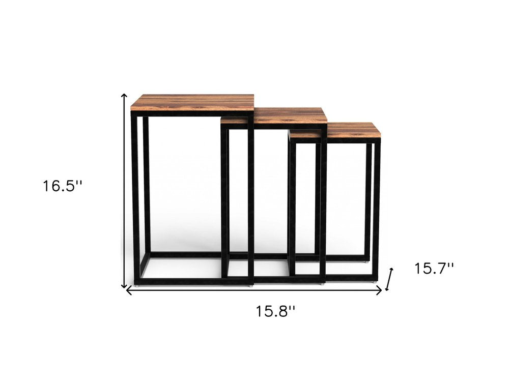 Set of three 17" black and brown solid wood nested tables.
